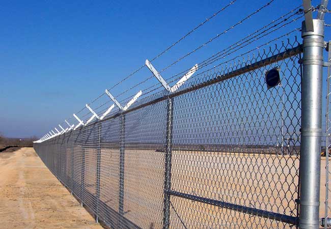 chain link with security top barbed wire