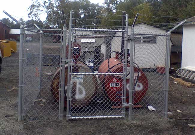 chain link with security top barbed wire